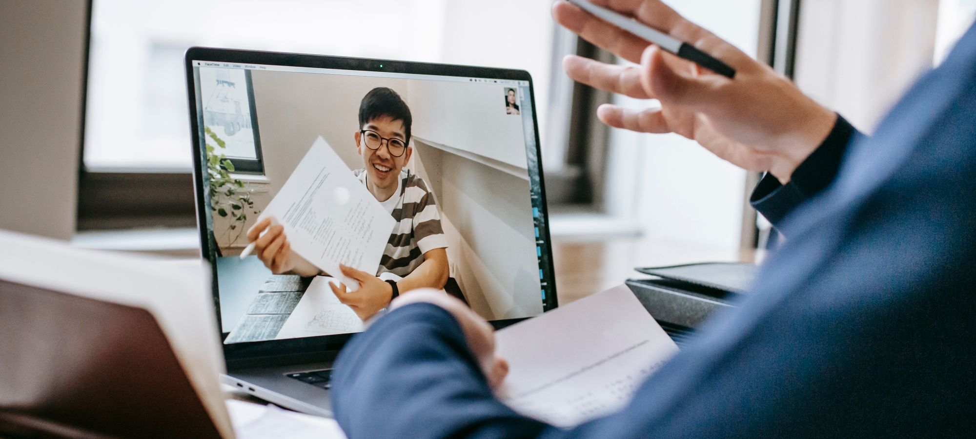 A video call between two professionals
