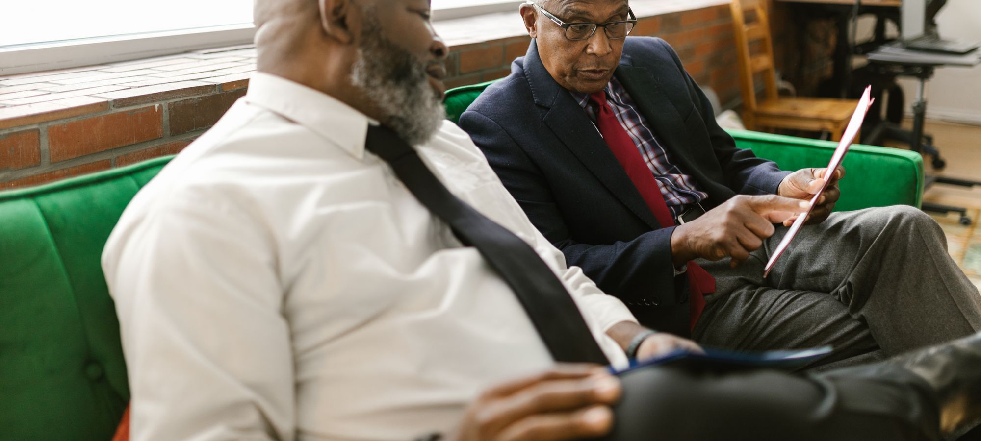 Two senior executives in a discussion