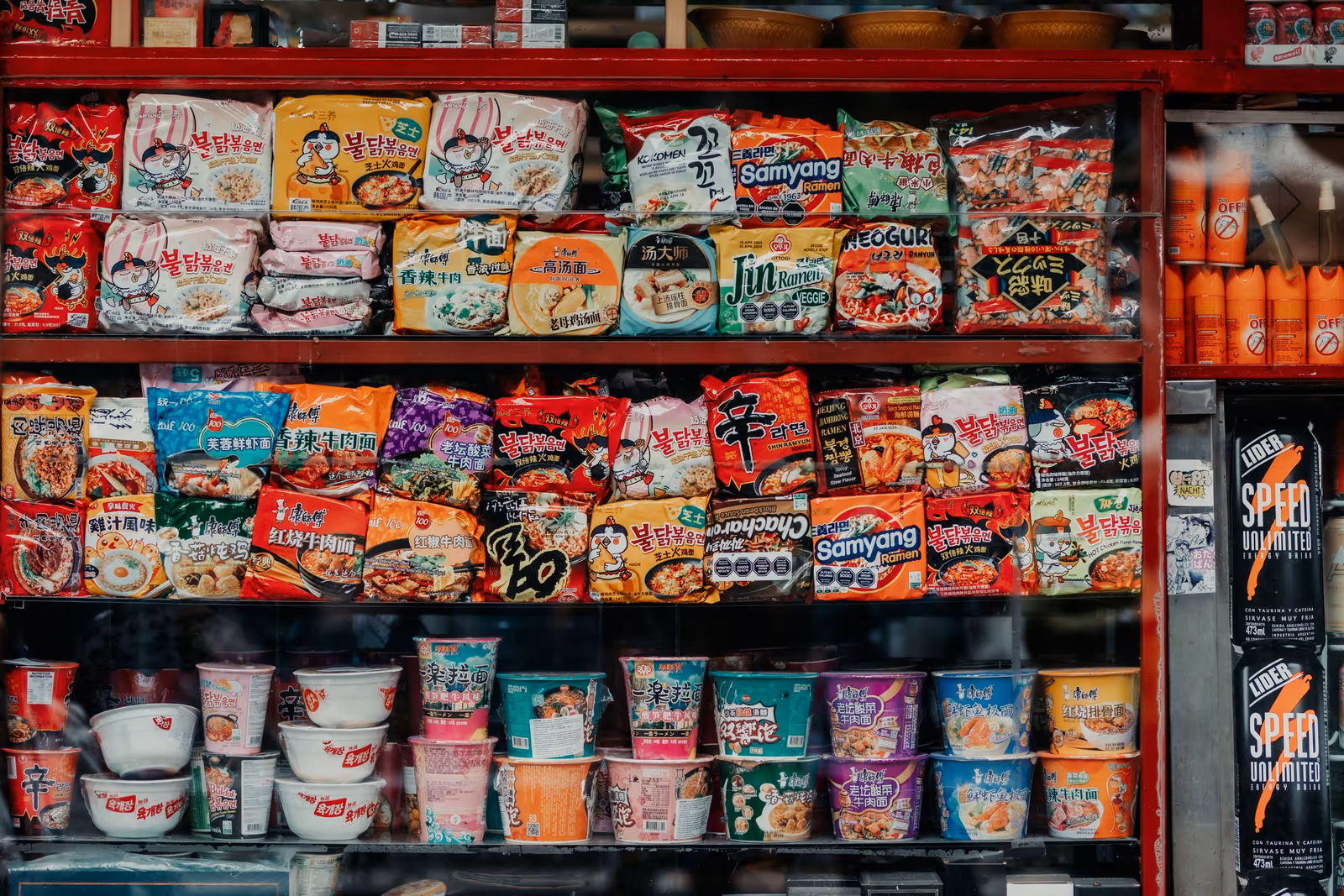 Instant noodle packs filling supermarket shelves
