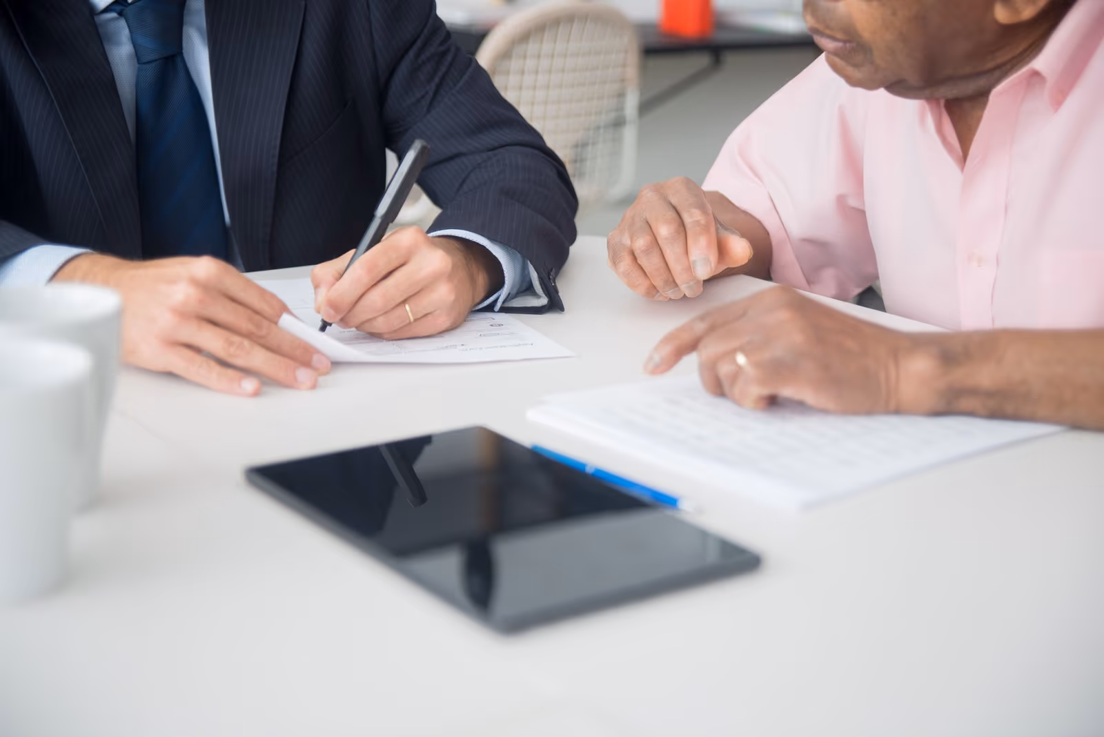 Two executives working through a plan together