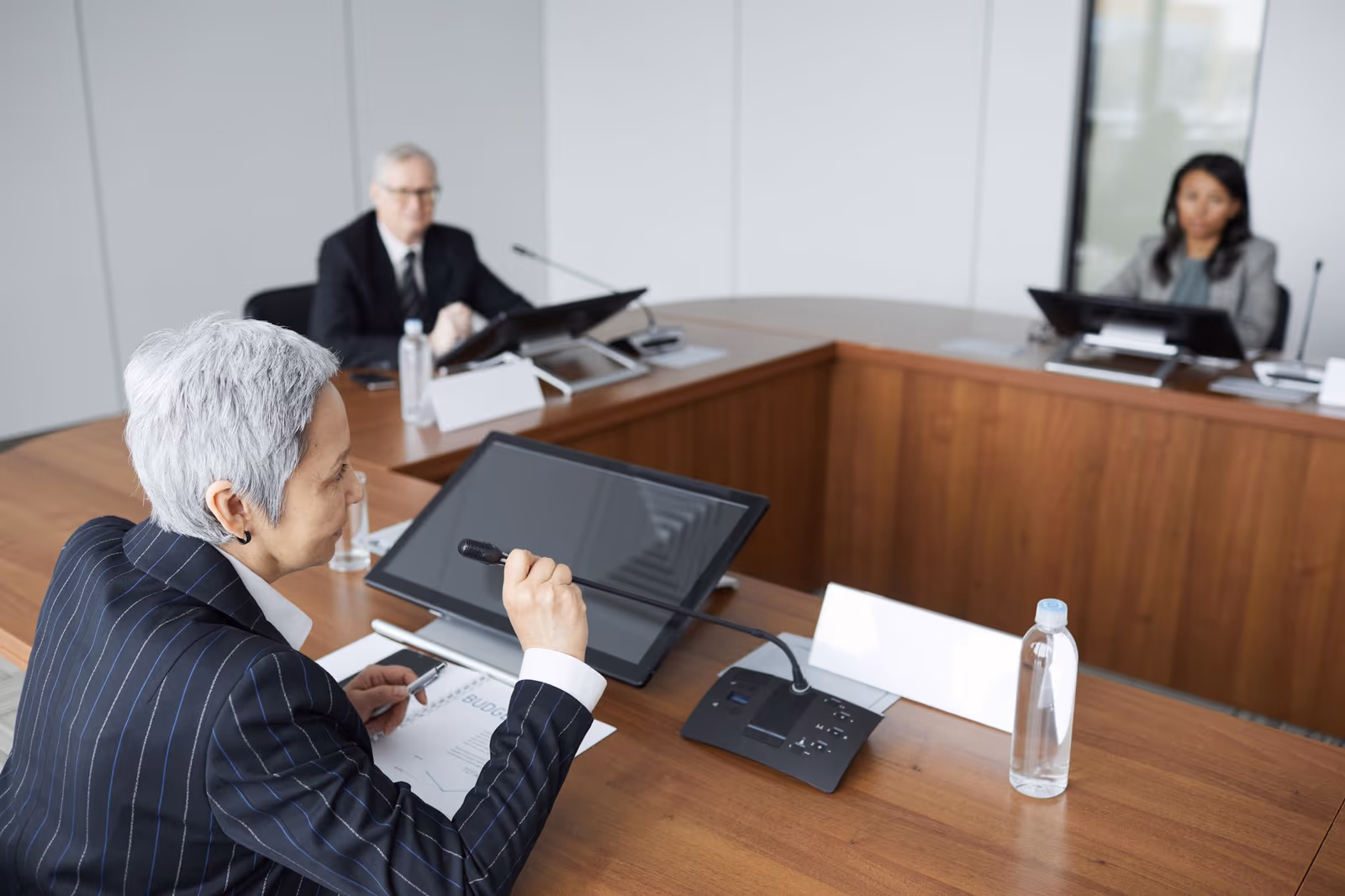 Senior executives in a boardroom discussion