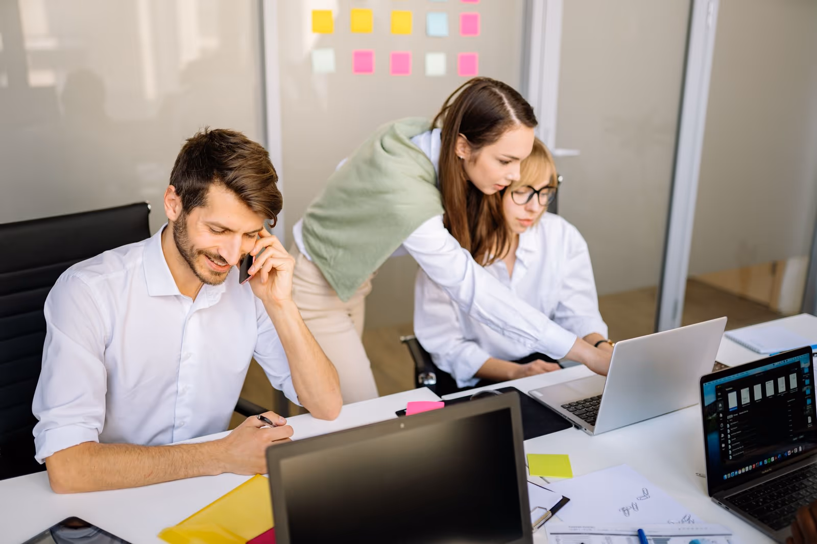 A consultant working alongside a client team