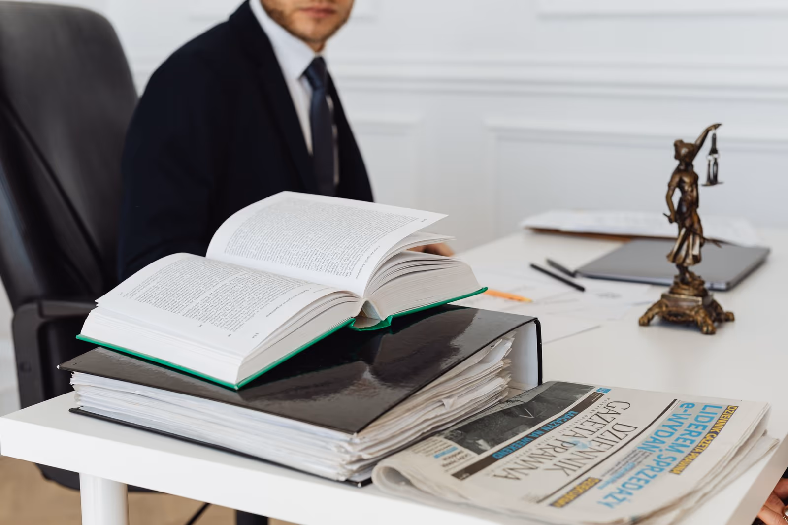Legal papers and case files on a desk