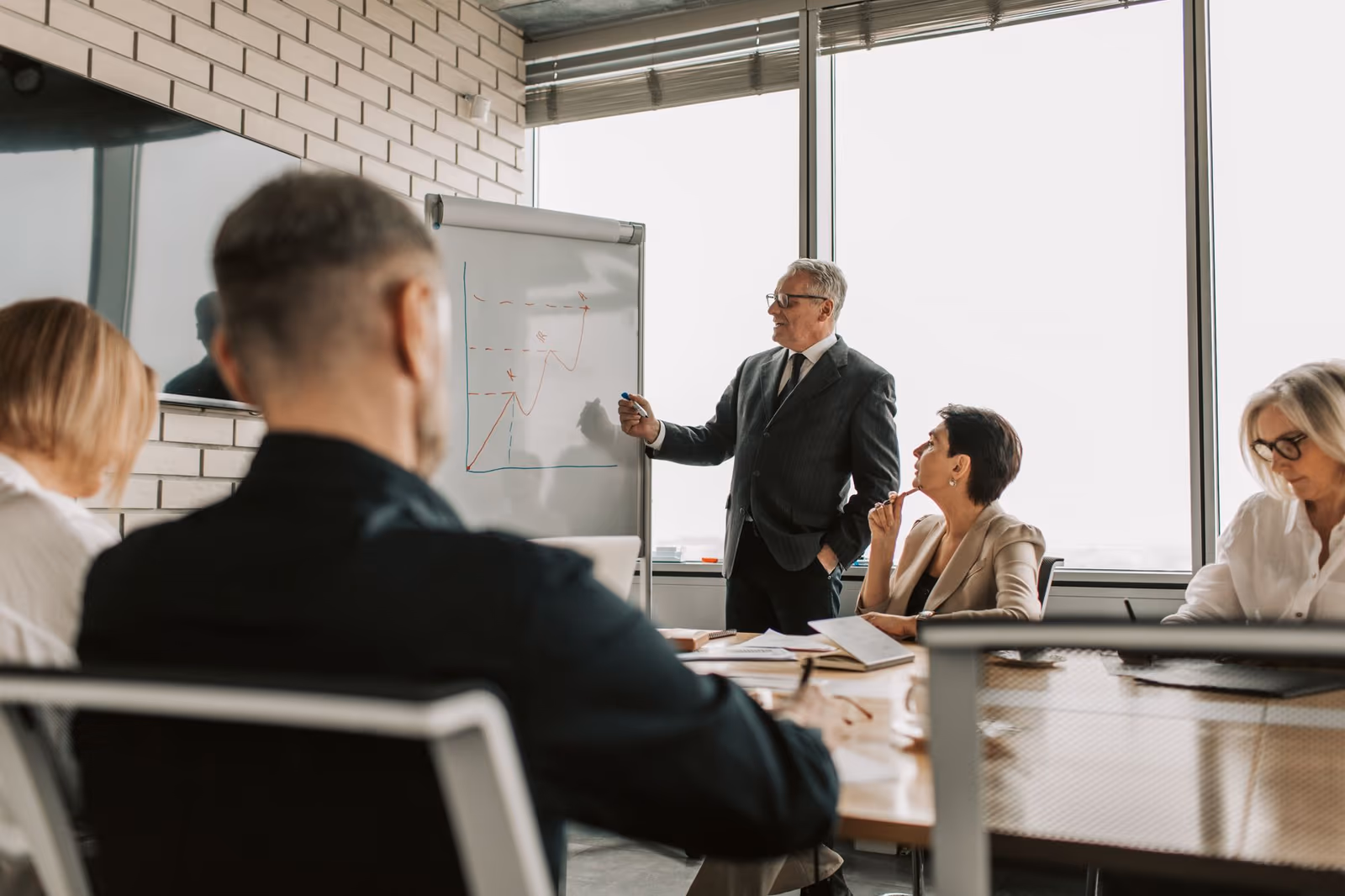 A consultant presenting to a client team