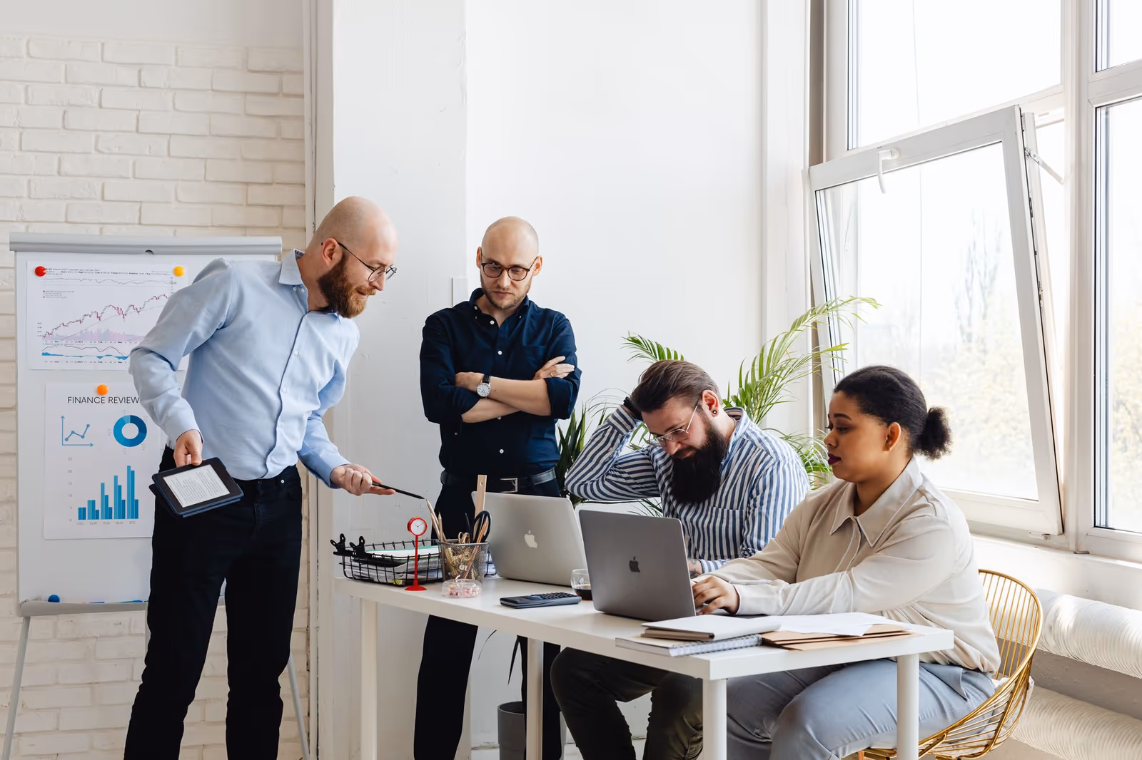 A strategy team working through a plan