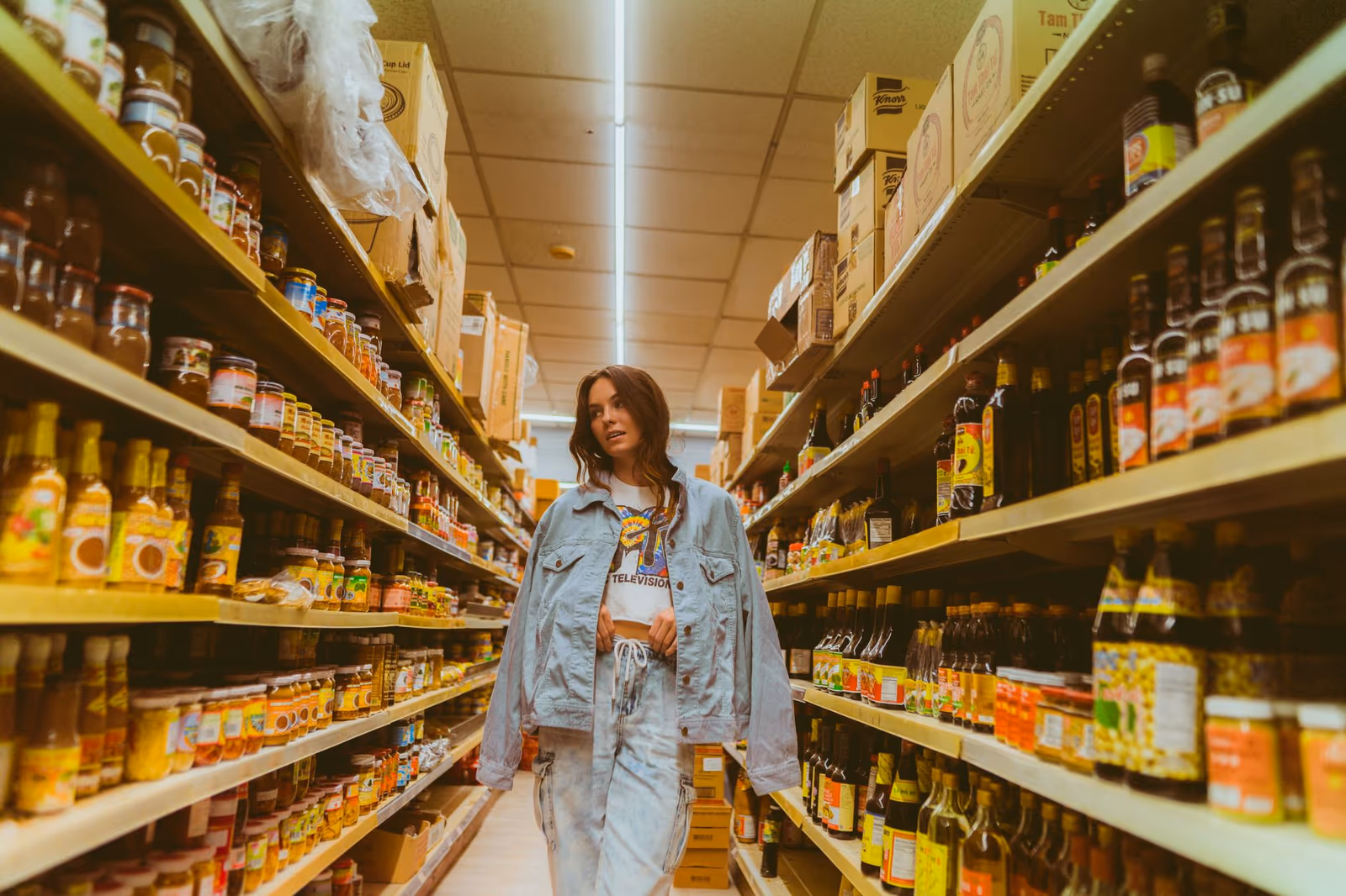 A researcher recording conditions in a retail aisle