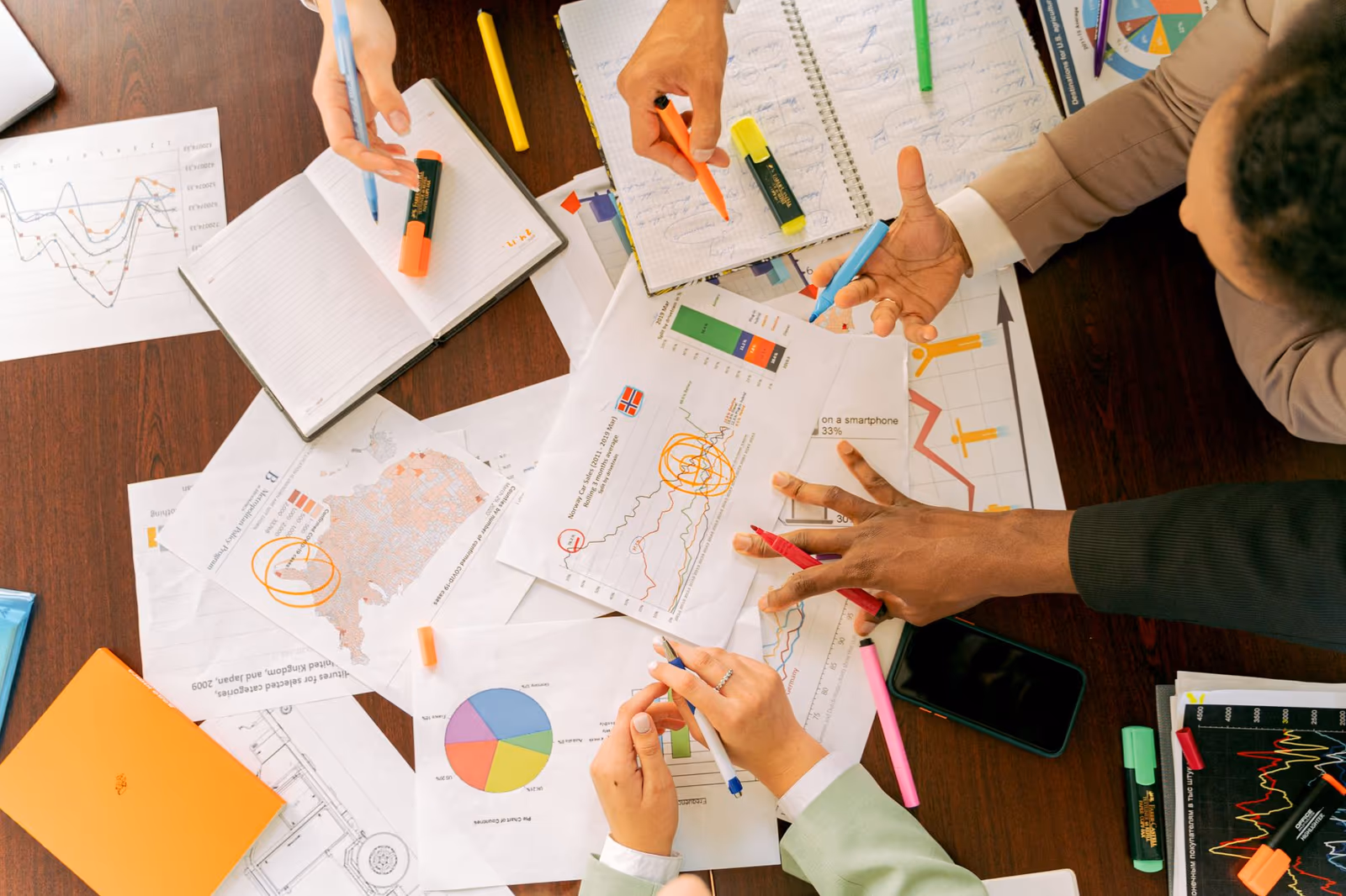 Notes and charts laid out during a working session