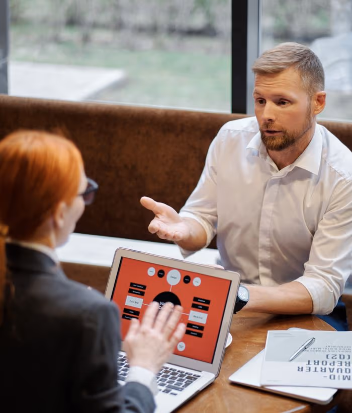 Consultants collaborating in a project room
