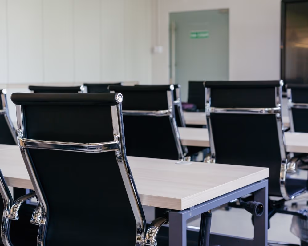An empty boardroom before a signing