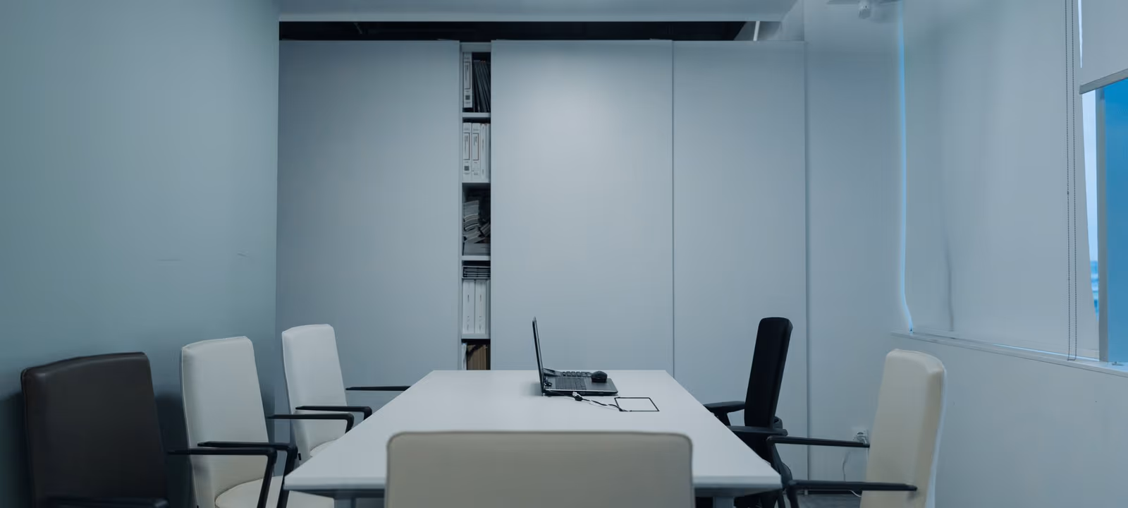 An empty boardroom before a committee meeting
