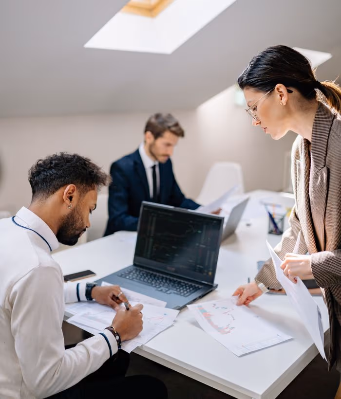 A team working through market data