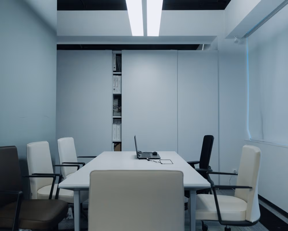 An empty meeting room before a morning call