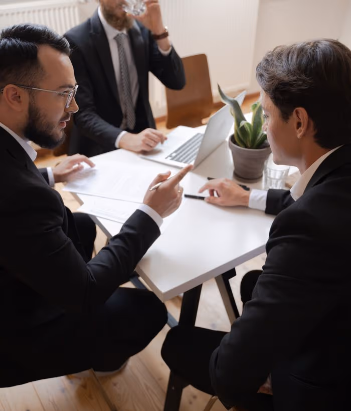 A corporate development team in a negotiation